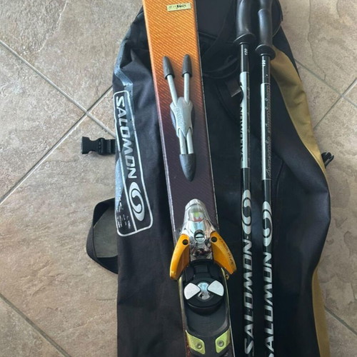 Salomon ski equipment used with bag, skis and poles