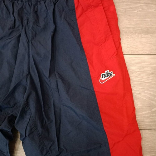 Nike track pants used, navy with red stripes