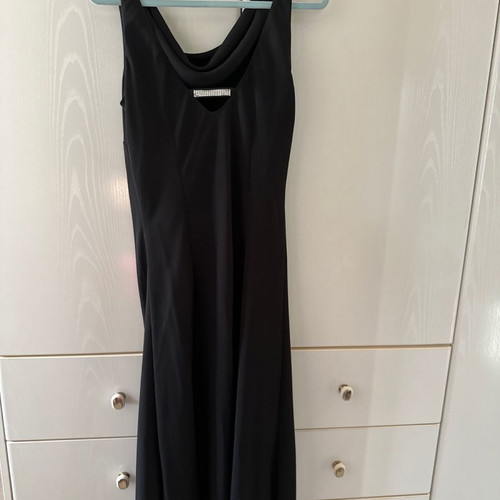 Black dress for special occasions size S with draped detail