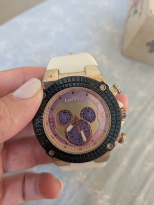 Lofty's wristwatch used, white and pink