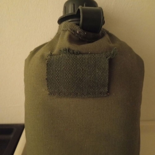 Plastic military canteen with case used
