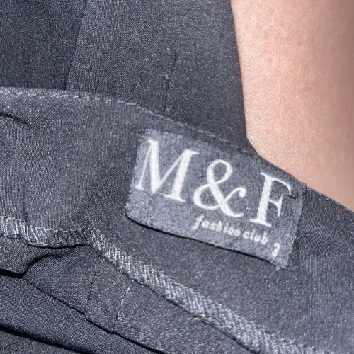M&F black skirt with side and front zippers, size M