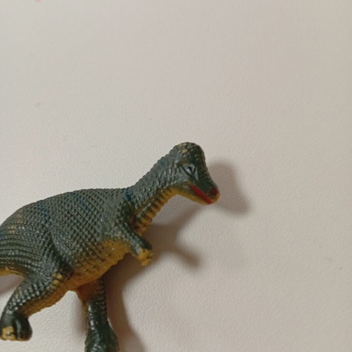 Miniature dinosaur figure like new