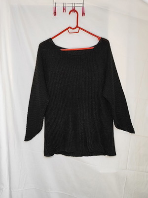 Black knitted sweater used with shiny detail and asymmetric sleeves size XL