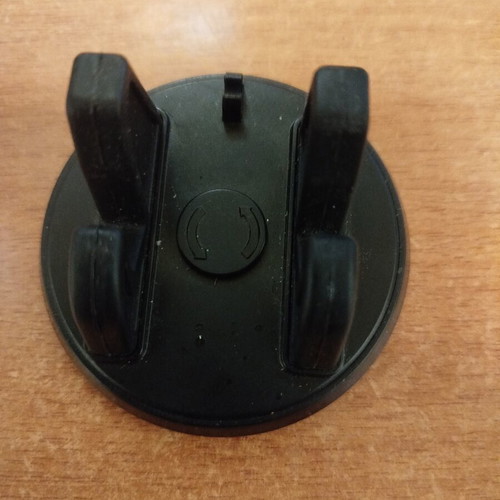 Mobile phone holder for desk or car used, rotating, with replacement adhesive