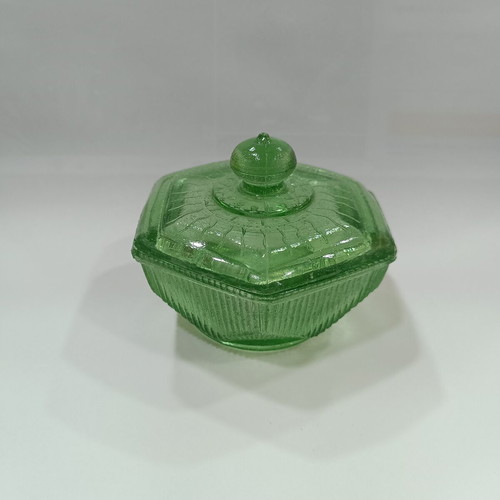 Vintage green pressed glass jewelry box with embossed lid and ridges