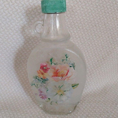 Handmade bottle decorated with decoupage technique, new