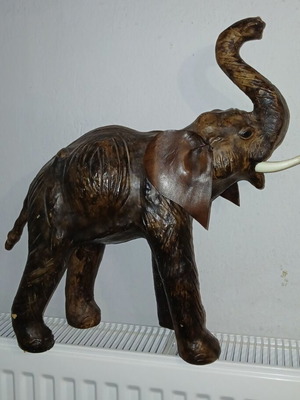 Elephant decorative large used 47x43cm with ear tear