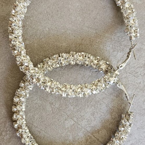 Silver hoop earrings with rhinestones