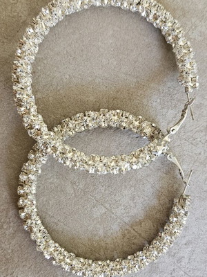 Silver hoop earrings with rhinestones