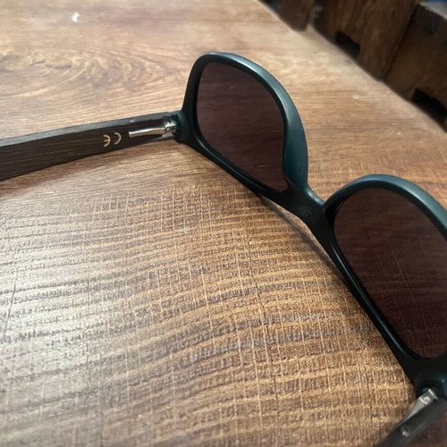 Jägermeister collectible sunglasses with bamboo arms, dark green frame
