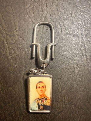 Vintage metal keychain with portrait of former King Constantine