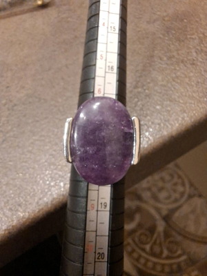 Purple stone ring used