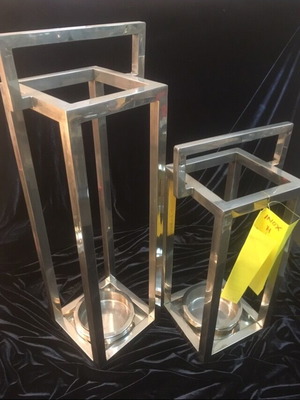 Stainless steel candlesticks used, floor and table