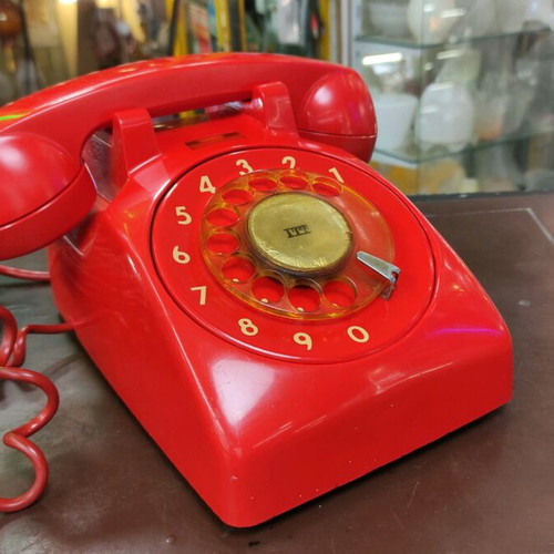 ITT telephone used, red, wired