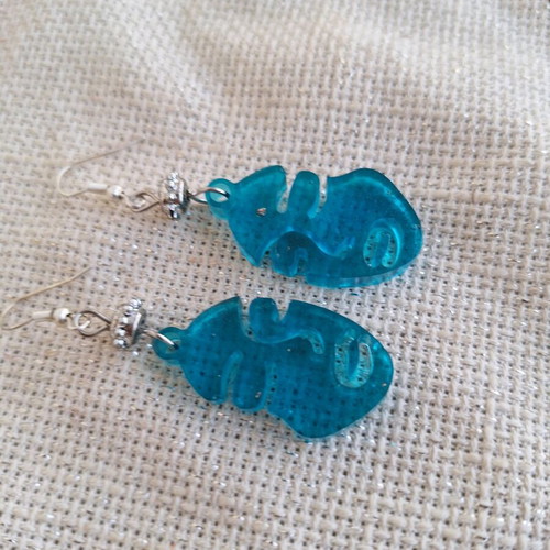 Blue liquid glass earrings with female face made to order