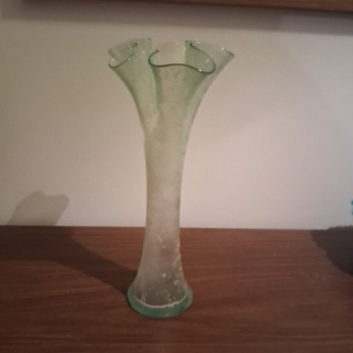 Glass vase with wavy rim used, vintage light green