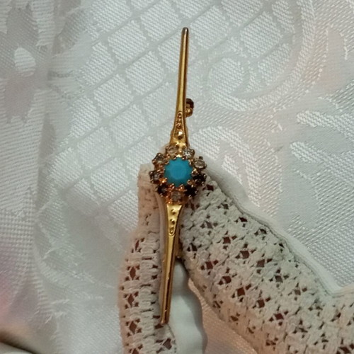 Vintage brooch with zircon and turquoise bead, used