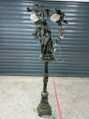 Antique lamp used with tall base and sculpture