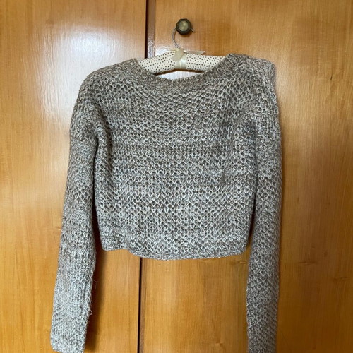 Knitted cardigan like new with golden thread in knit