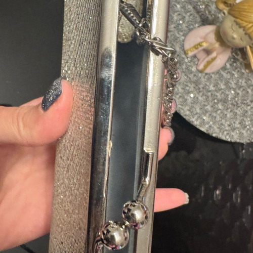 Evening handbag like new in champagne color with chain