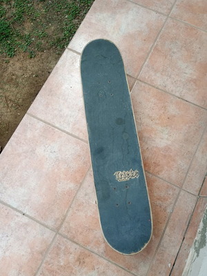 Tricks скейтборд употребяван с видими следи от употреба