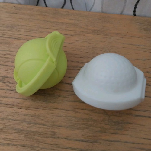 Egg molds set of 2 like new, golf ball and tennis ball shapes