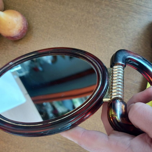 Hand mirror used, dimensions 17.5x13 cm, does not stand