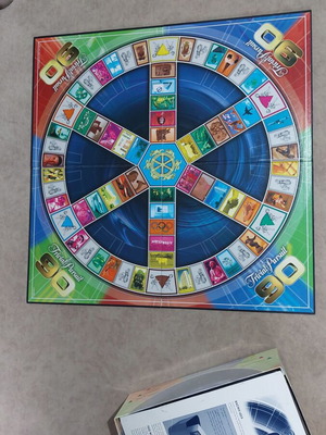 Trivial Pursuit the 90's board game used with torn board