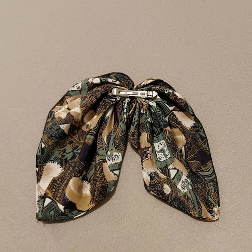 Hair clip used with olive and beige color