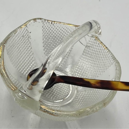 Two small glass baskets with spoon for caviar used