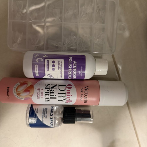 Nail care set with polish remover and quick dry spray