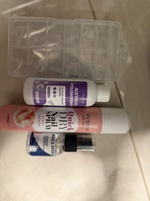 Nail care set with polish remover and quick dry spray