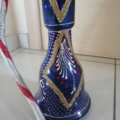 Oriental hookah used with stained glass bottle