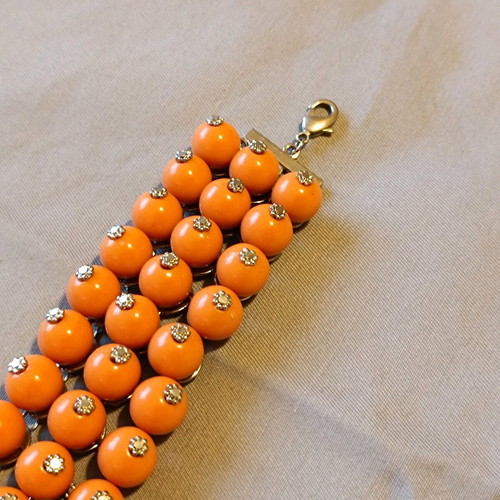 Accessorize bracelet used with orange beads 21 cm
