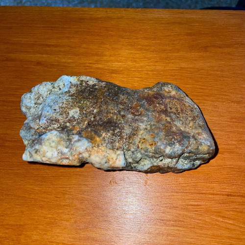 Natural rock with quartz and iron oxides