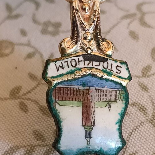 Vintage souvenir spoon from Stockholm with enamel decoration
