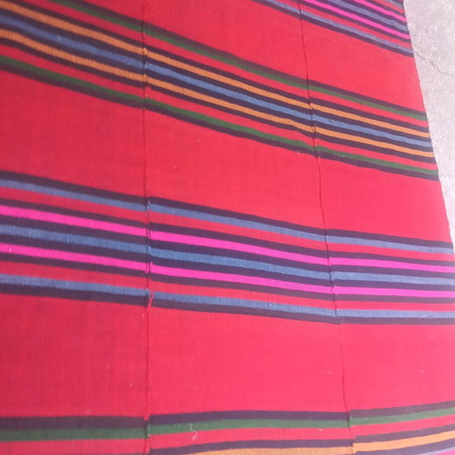 Authentic 100 percent handwoven wool rug used
