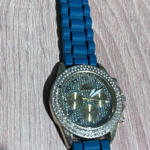 Watch like new with blue plastic and elastic strap