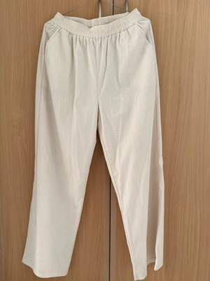 Women's pants with corduroy texture, wide fit, size L-XL, like new, beige