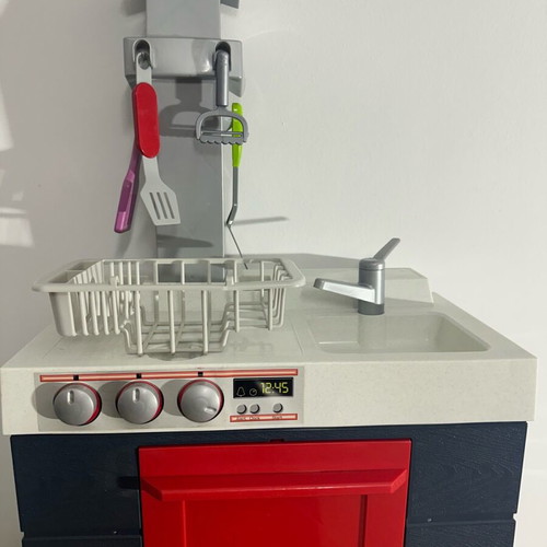 Children's kitchen used with accessories