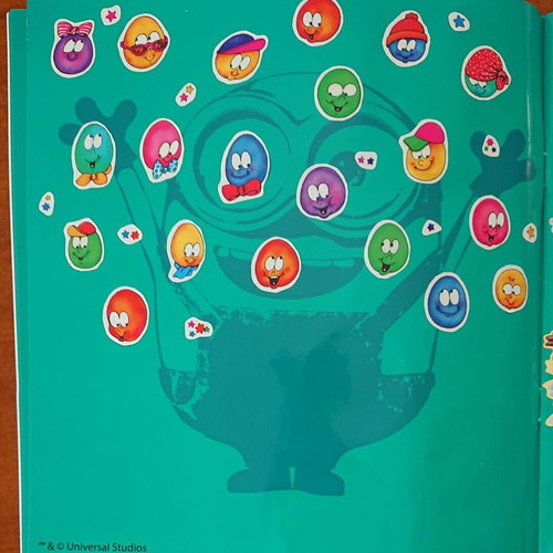 Minions sticker album used, half completed by GIM S.A.