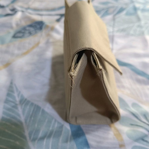Small beige toiletry bag like new