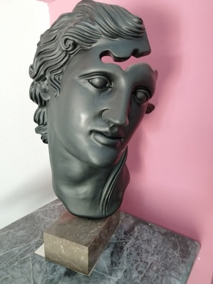 Ceramic head of young man used with marble base