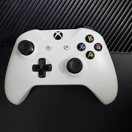Xbox One 1TB console used with controller and 2 games