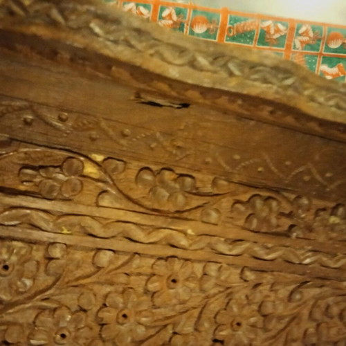 Carved wooden tray used with brass inlay