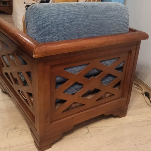 Wooden armchair with carved sides and back