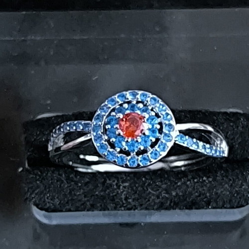 Ring with blue and red stones, elegant design