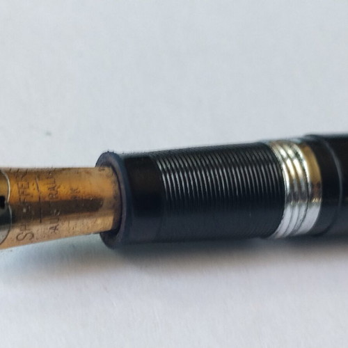 Sheaffer's vintage fountain pen set with 14K gold nibs and desk base, used