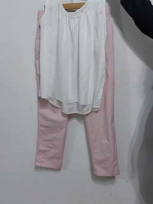Set of 2 complete used outfits with pants and tops